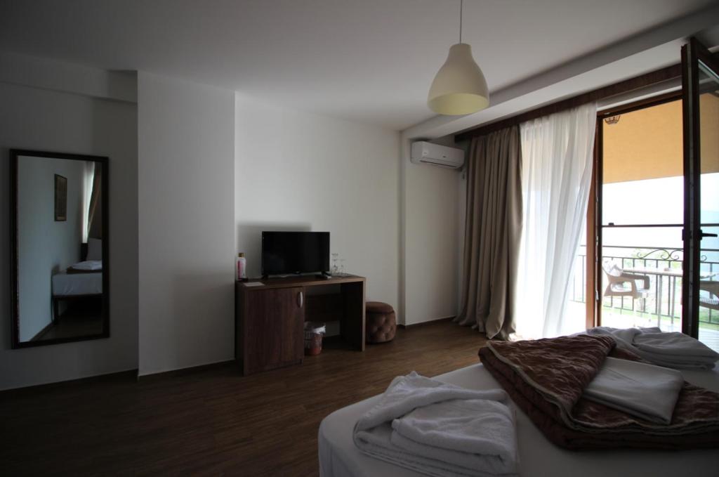 Postel nebo postele na pokoji v ubytování Hotel La Terrazza