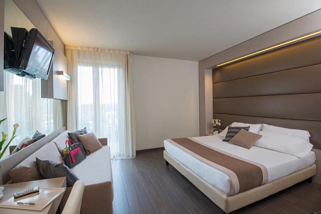 Postel nebo postele na pokoji v ubytování As Hotel Dei Giovi