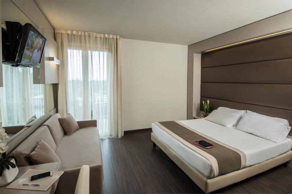 Postel nebo postele na pokoji v ubytování As Hotel Dei Giovi
