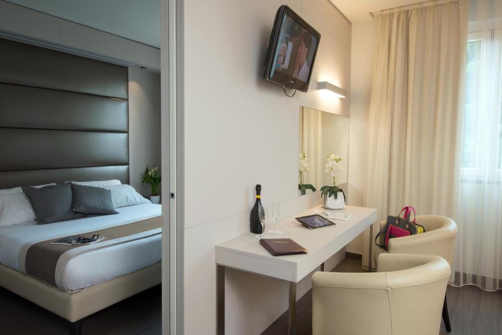 TV a/nebo společenská místnost v ubytování As Hotel Dei Giovi
