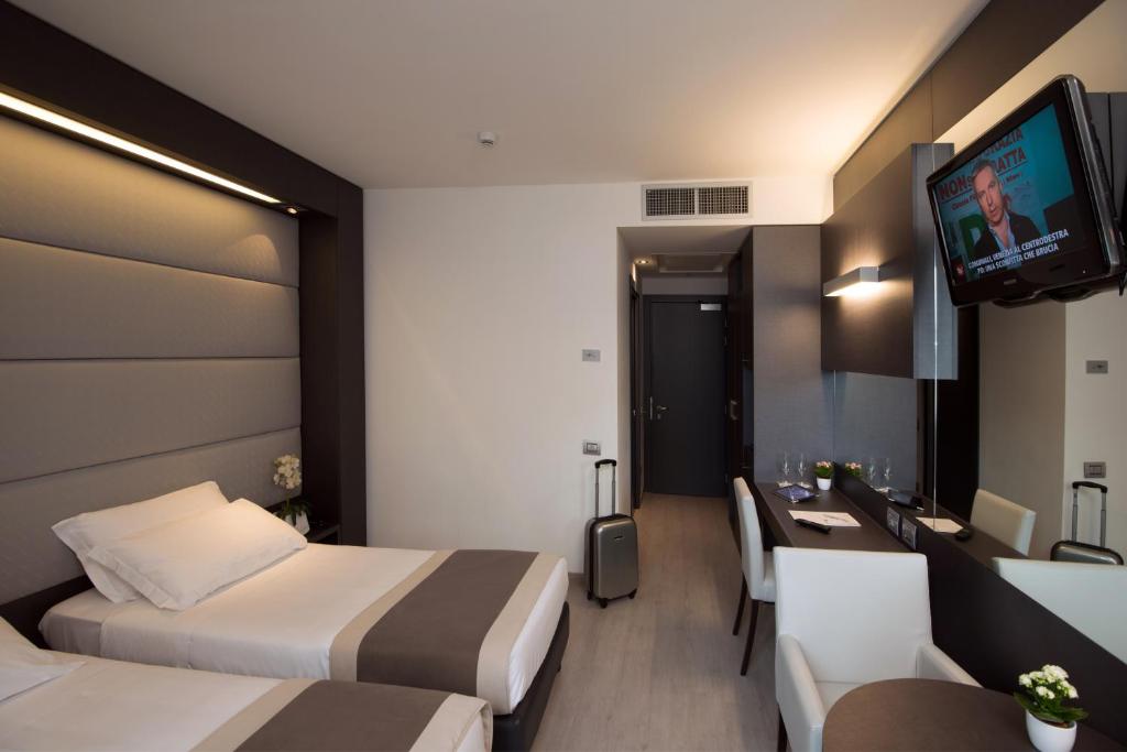 TV a/nebo společenská místnost v ubytování As Hotel Dei Giovi