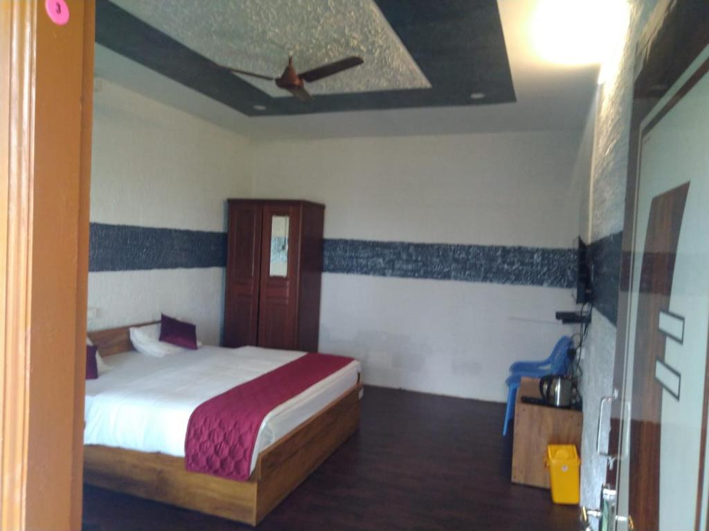 Postel nebo postele na pokoji v ubytování Cholai Resorts & Hotels