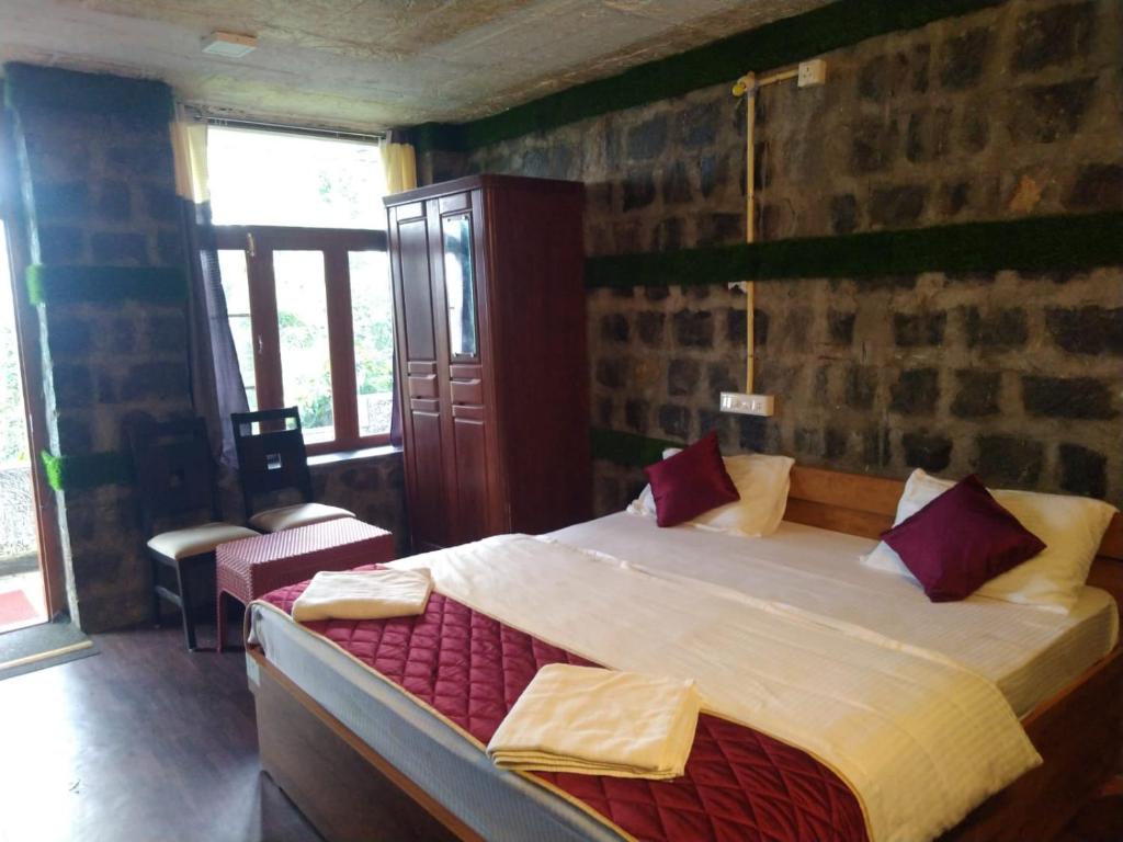 Postel nebo postele na pokoji v ubytování Cholai Resorts & Hotels