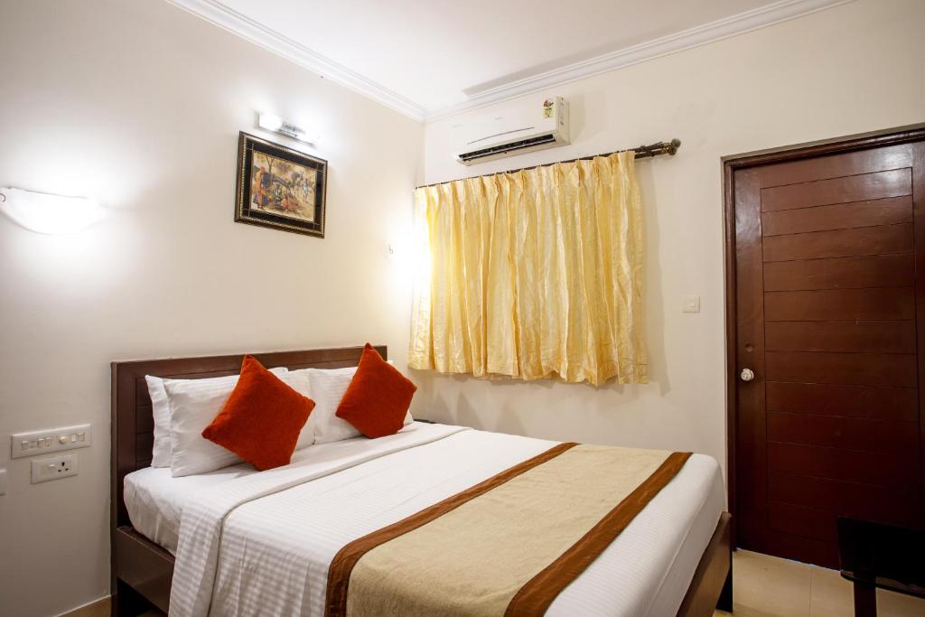 Postel nebo postele na pokoji v ubytování Goa Villagio Resort & Spa - A Unit of IHM, 10 Min Walk from Beach