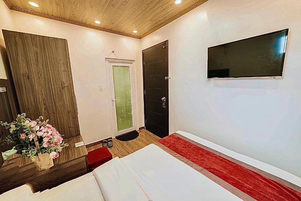 TV a/nebo společenská místnost v ubytování Le Tuan Minh Hotel