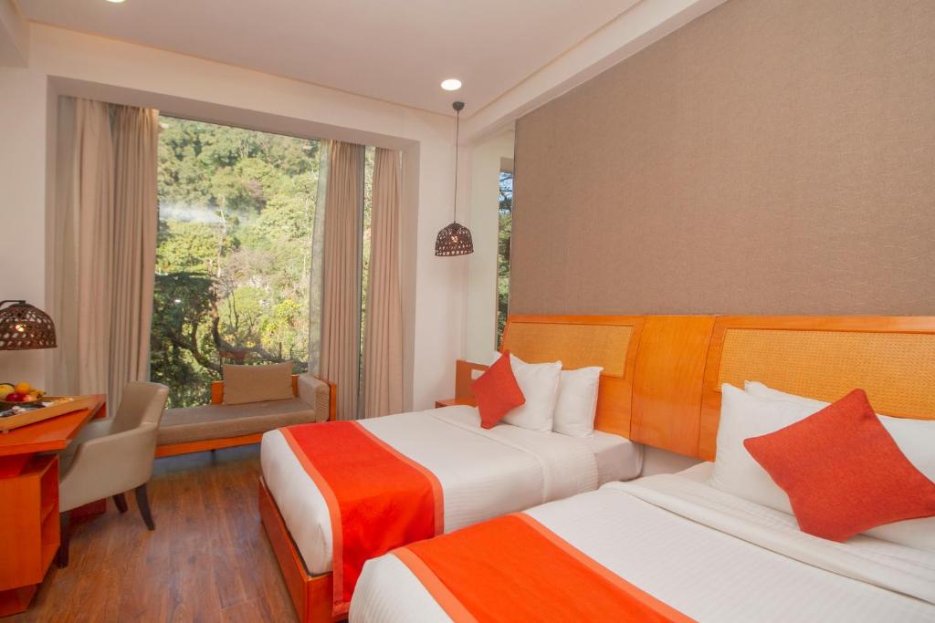 Postel nebo postele na pokoji v ubytování Yog Wellness Resort & Spa By Amritara
