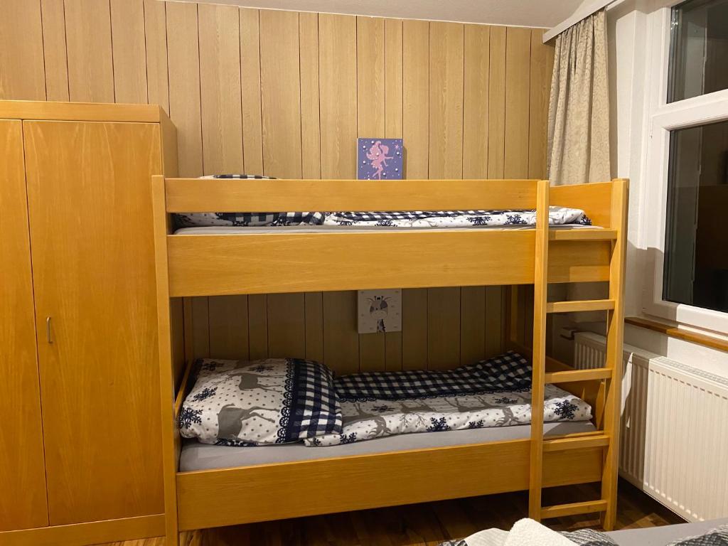 Postel nebo postele na pokoji v ubytování FeWo Panoramablick mit Pool und Sauna inklusive