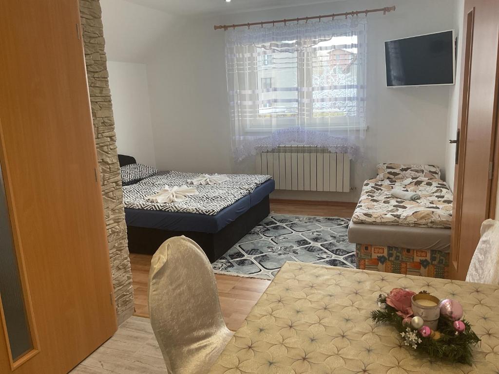 Postel nebo postele na pokoji v ubytování Homestay Renata