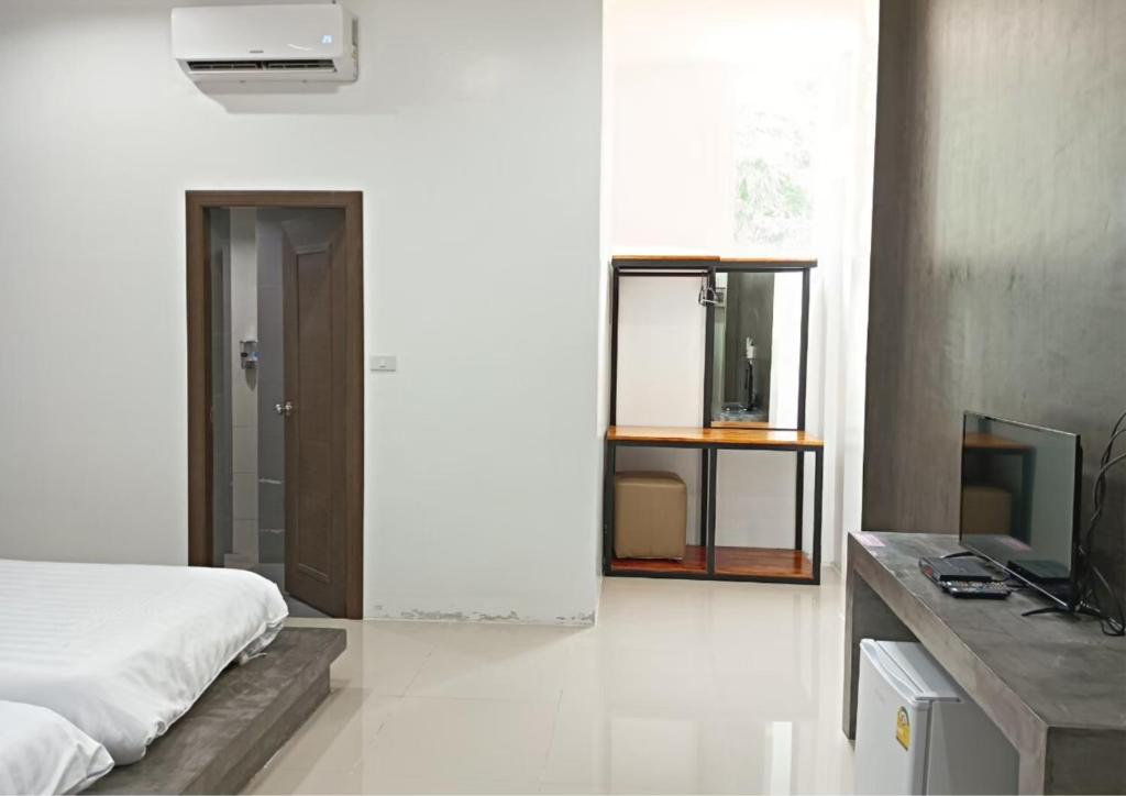 Postel nebo postele na pokoji v ubytování 22 Twenty-Two Hotel ทะเวนตี้-ทู โฮเทล