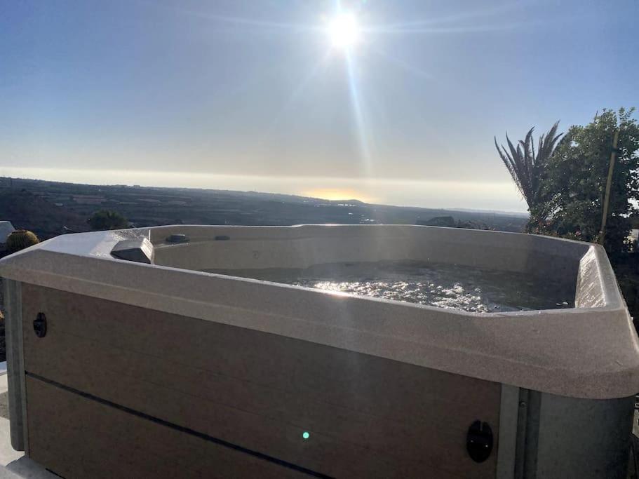 a large bath tub sitting on top of a roof at private loft-sea views-Jacuzzi in La Asomada