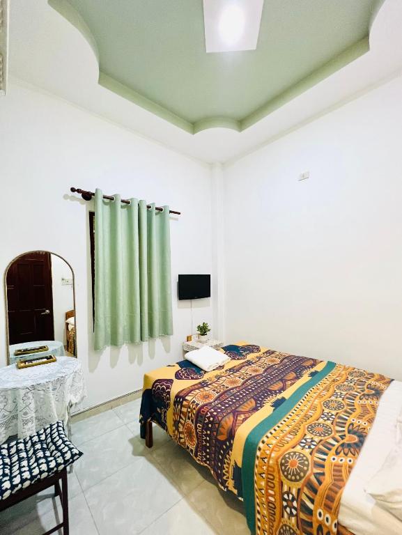Giường trong phòng chung tại AN Homestay Phan Thiết