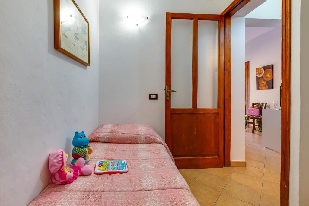Postel nebo postele na pokoji v ubytování Case Vacanze Castellana Dream