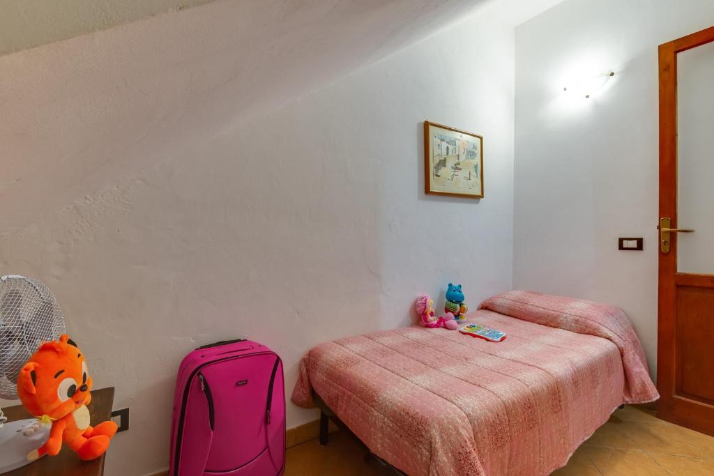 Postel nebo postele na pokoji v ubytování Case Vacanze Castellana Dream