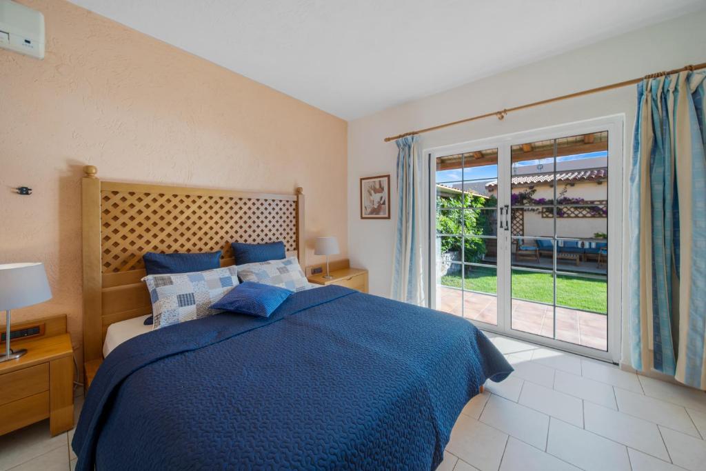 Postel nebo postele na pokoji v ubytování Sissi Hills Villa