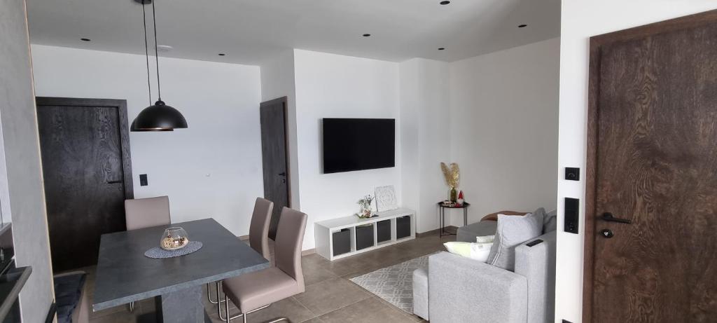 TV a/nebo společenská místnost v ubytování Apartment Talblick