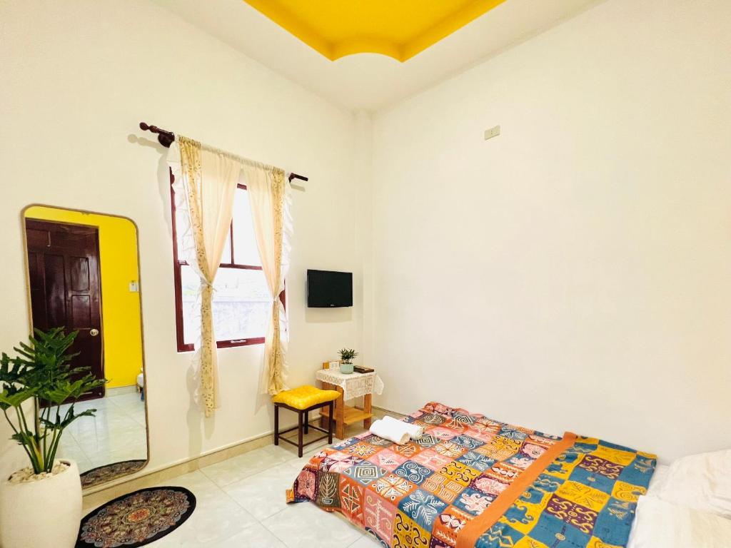 Giường trong phòng chung tại AN Homestay Phan Thiết
