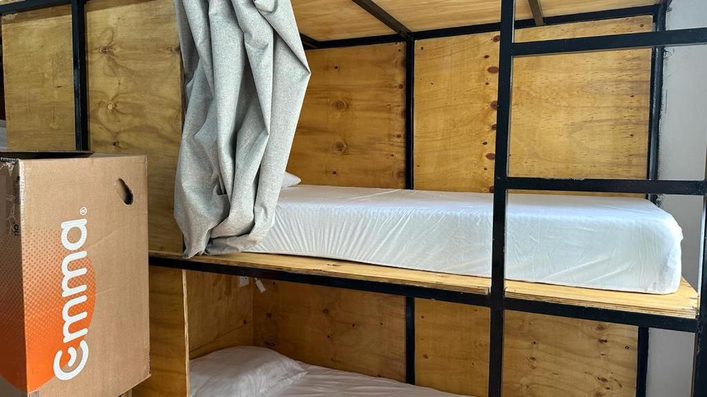 Postel nebo postele na pokoji v ubytování Hostel Hug Brasil