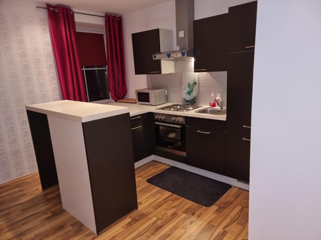 Kuchyň nebo kuchyňský kout v ubytování Rentcenter79_2