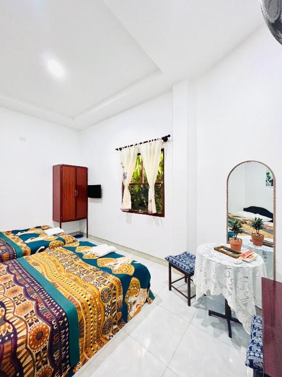 Giường trong phòng chung tại AN Homestay Phan Thiết