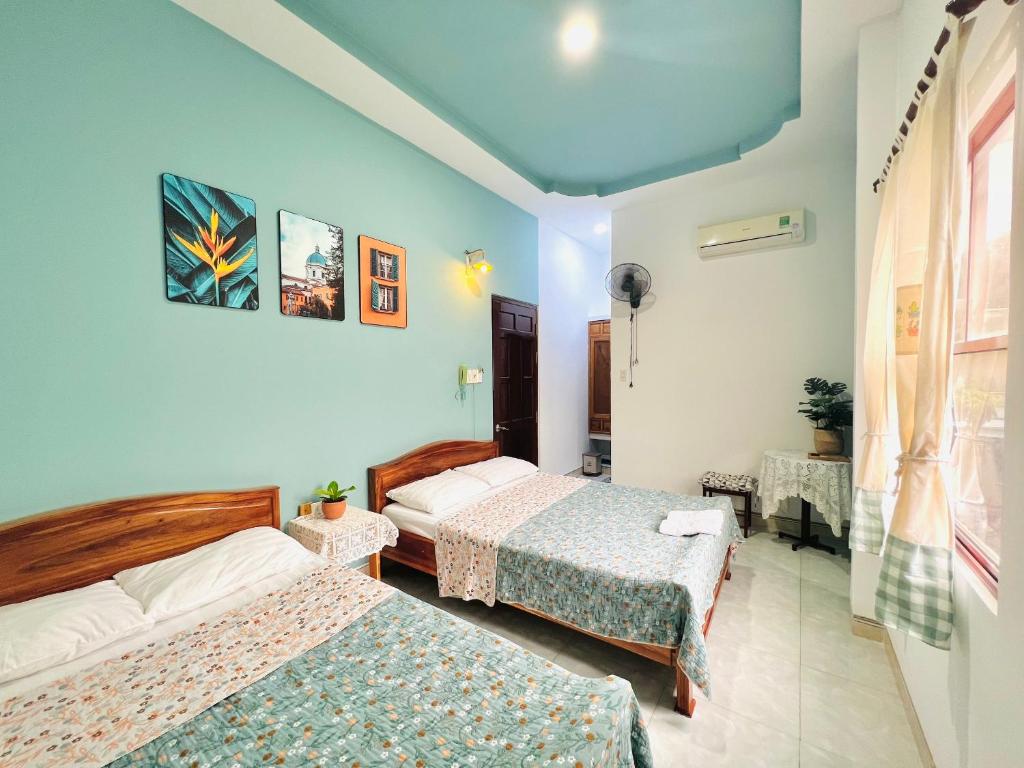 Giường trong phòng chung tại AN Homestay Phan Thiết