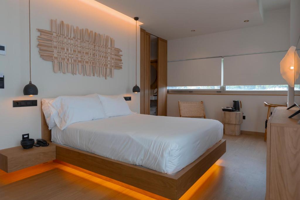 Posteľ alebo postele v izbe v ubytovaní Malates Slow Boutique Hotel