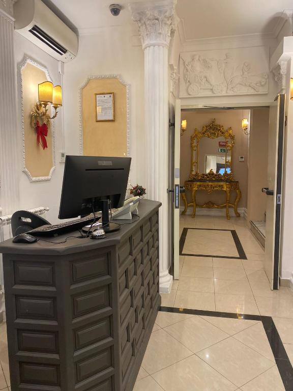 TV a/nebo společenská místnost v ubytování Hotel Erdarelli