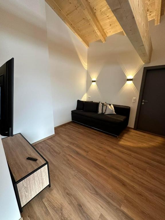 TV a/nebo společenská místnost v ubytování Appartement Kramerhaus