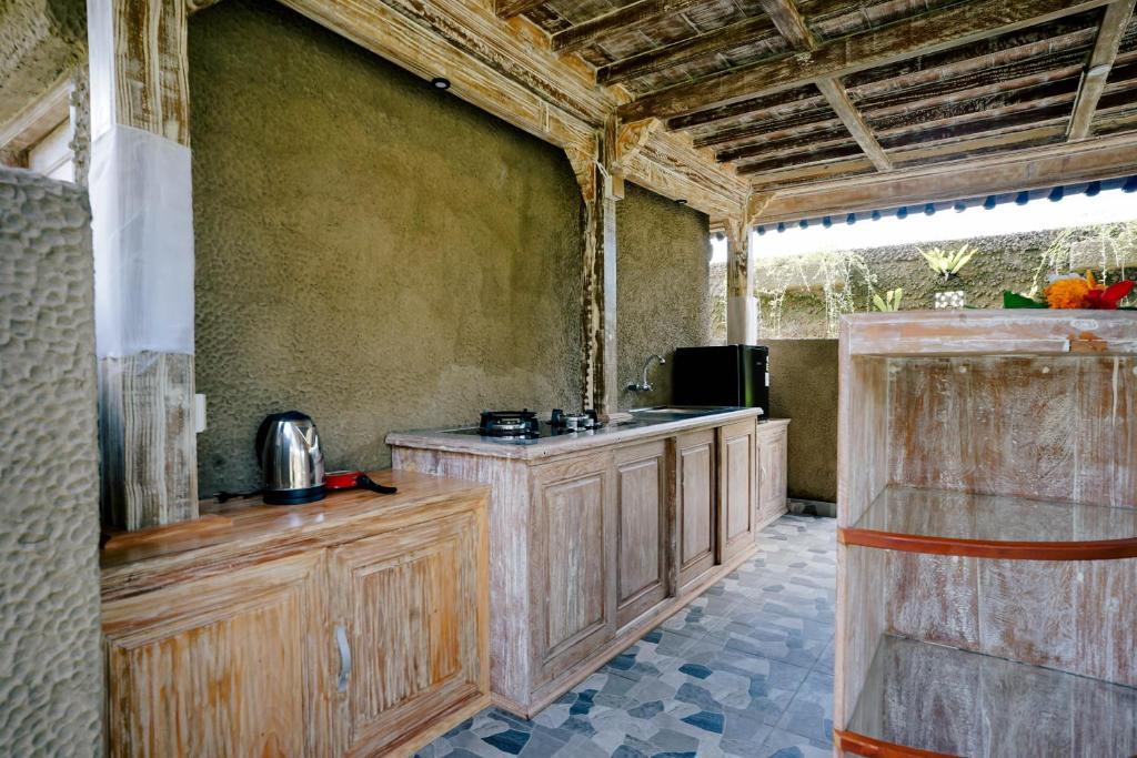 Kuchyň nebo kuchyňský kout v ubytování Alvia Joglo House & Private Pool