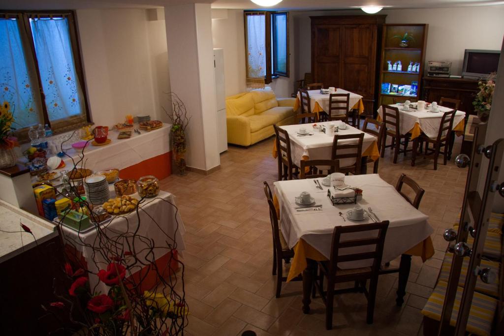 Posezení v ubytování P&P Assisi Camere