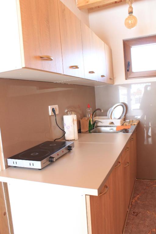 Kuchyň nebo kuchyňský kout v ubytování Three Houses