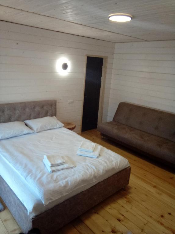 Postel nebo postele na pokoji v ubytování Chalet Ivanna