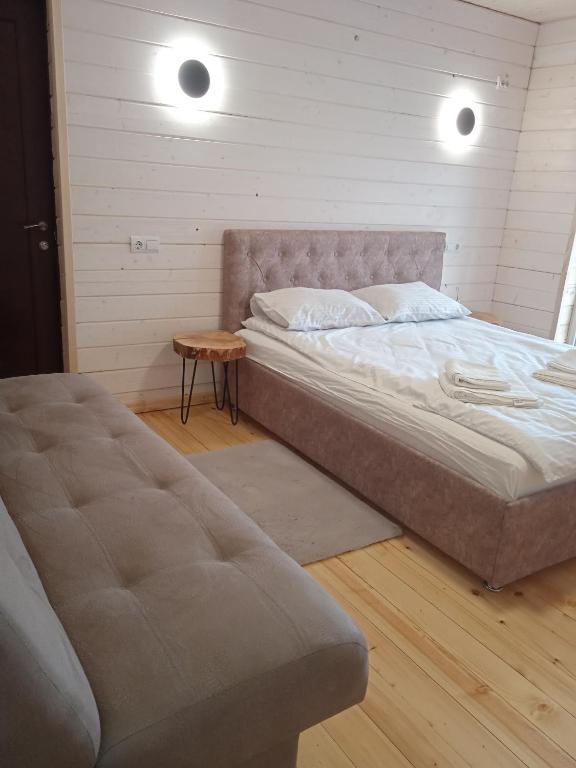 Postel nebo postele na pokoji v ubytování Chalet Ivanna