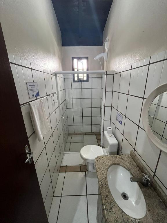 Um banheiro em Hotel D'Luz