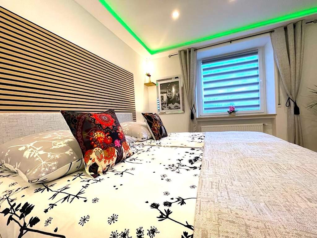 Postel nebo postele na pokoji v ubytování Hotel Uthoff