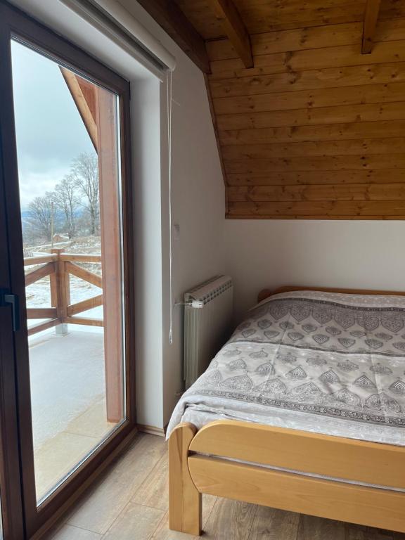 Postel nebo postele na pokoji v ubytování Prika Žika