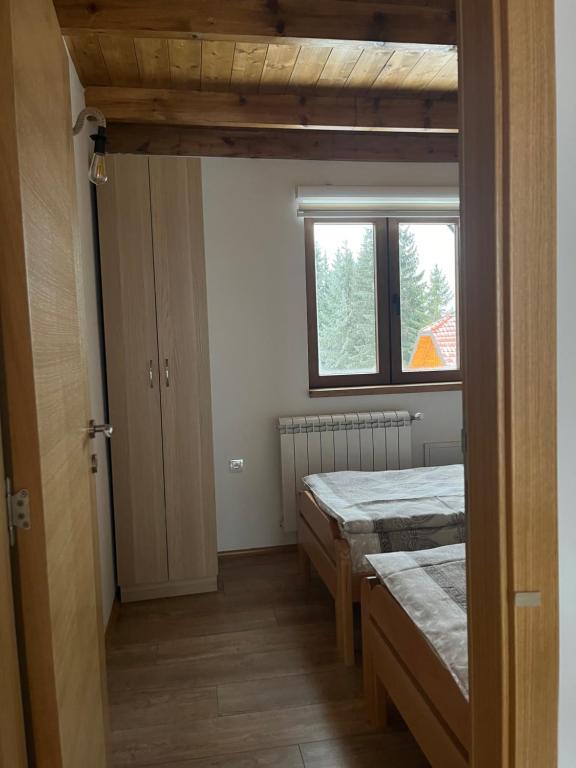 Postel nebo postele na pokoji v ubytování Prika Žika