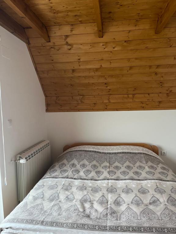 Postel nebo postele na pokoji v ubytování Prika Žika