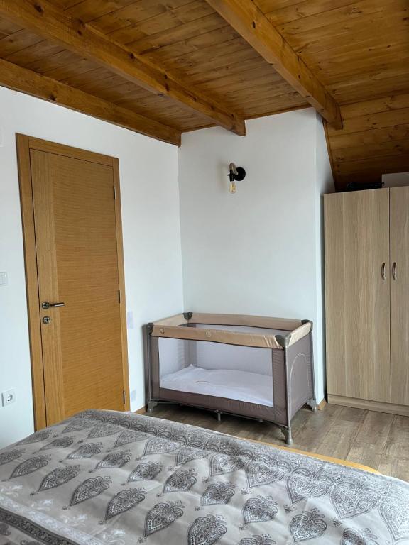 Postel nebo postele na pokoji v ubytování Prika Žika