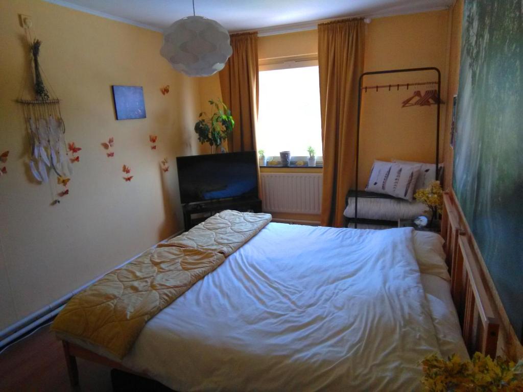 Postel nebo postele na pokoji v ubytování Gastenkamers De Zonnepoort vzw