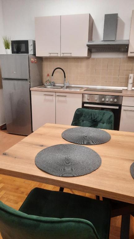 Kuchyň nebo kuchyňský kout v ubytování Apartman Tena