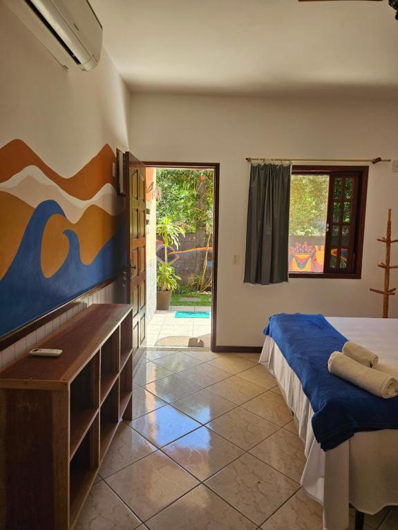 Postel nebo postele na pokoji v ubytování Raio de Sol pousada & camping