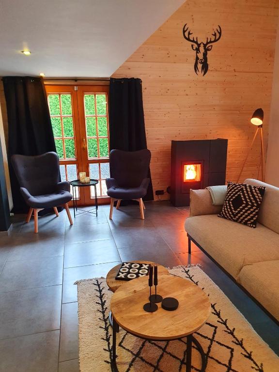 Posezení v ubytování Chalet Mésange