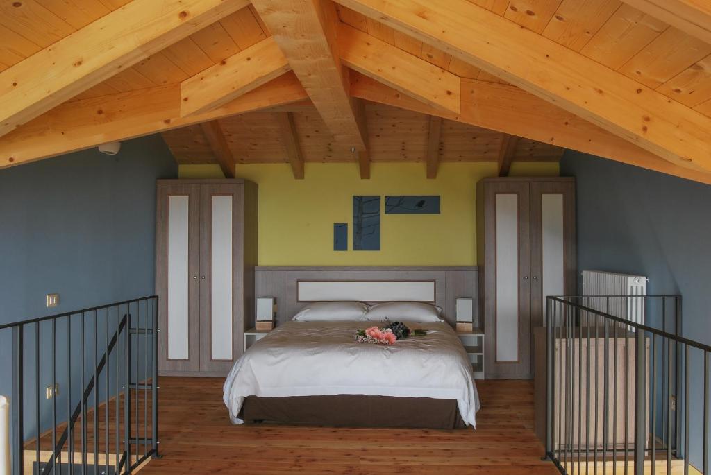 Ένα ή περισσότερα κρεβάτια σε δωμάτιο στο Residence Usignolo