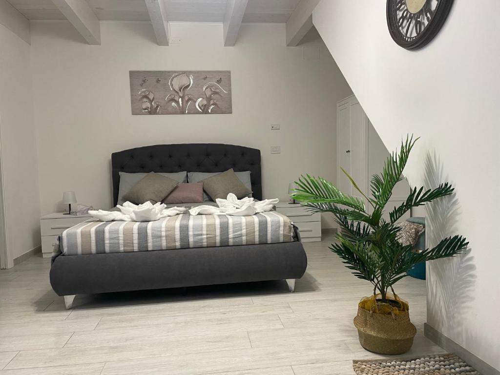 Postel nebo postele na pokoji v ubytování B&B La Fortezza