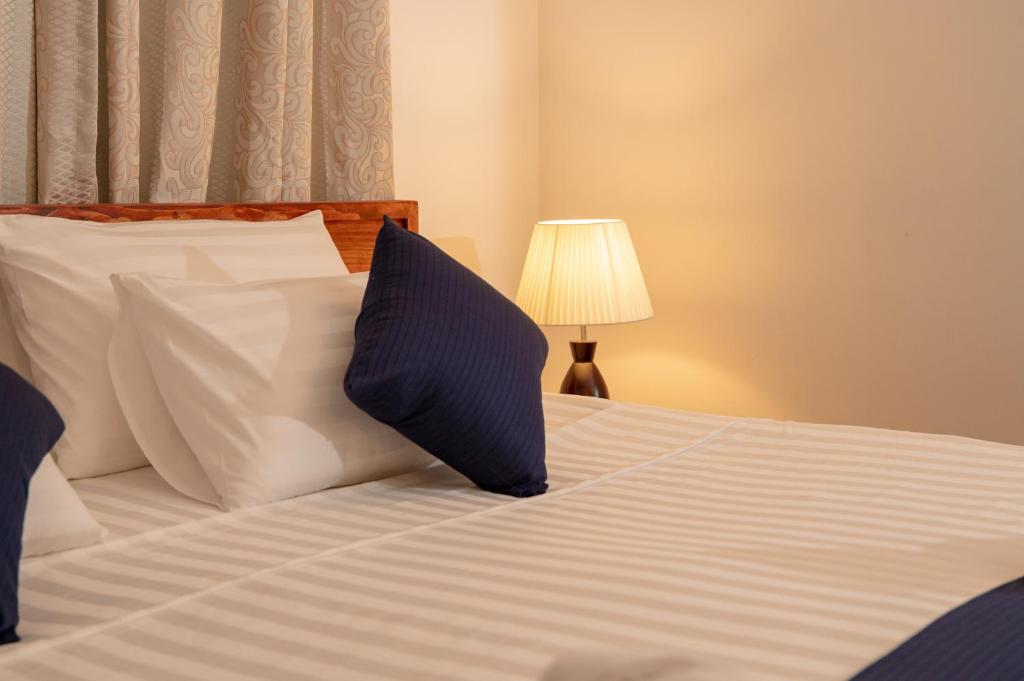 Postel nebo postele na pokoji v ubytování Biosphere Inn