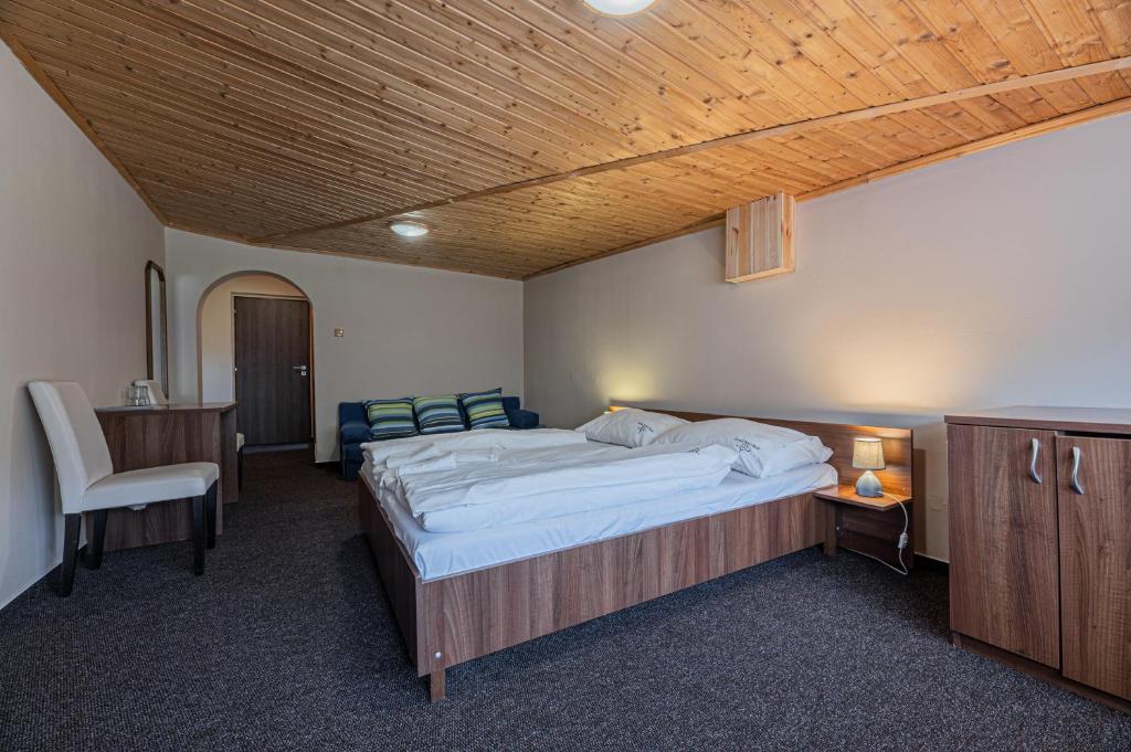 Postel nebo postele na pokoji v ubytování Grand Hotel rooms