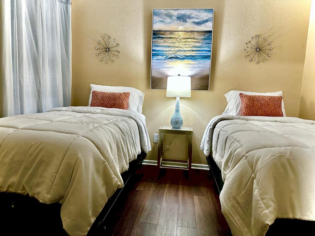 Ένα ή περισσότερα κρεβάτια σε δωμάτιο στο Eagle Stay 7 Condo