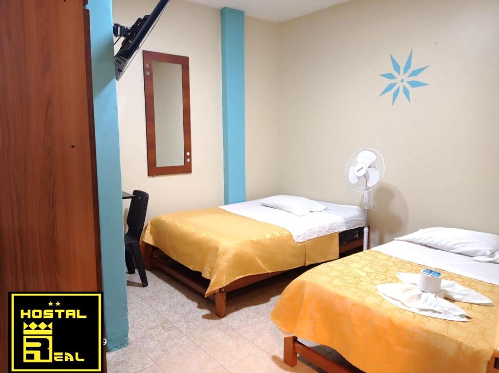 Postel nebo postele na pokoji v ubytování Hostal Real Piura - Oficial