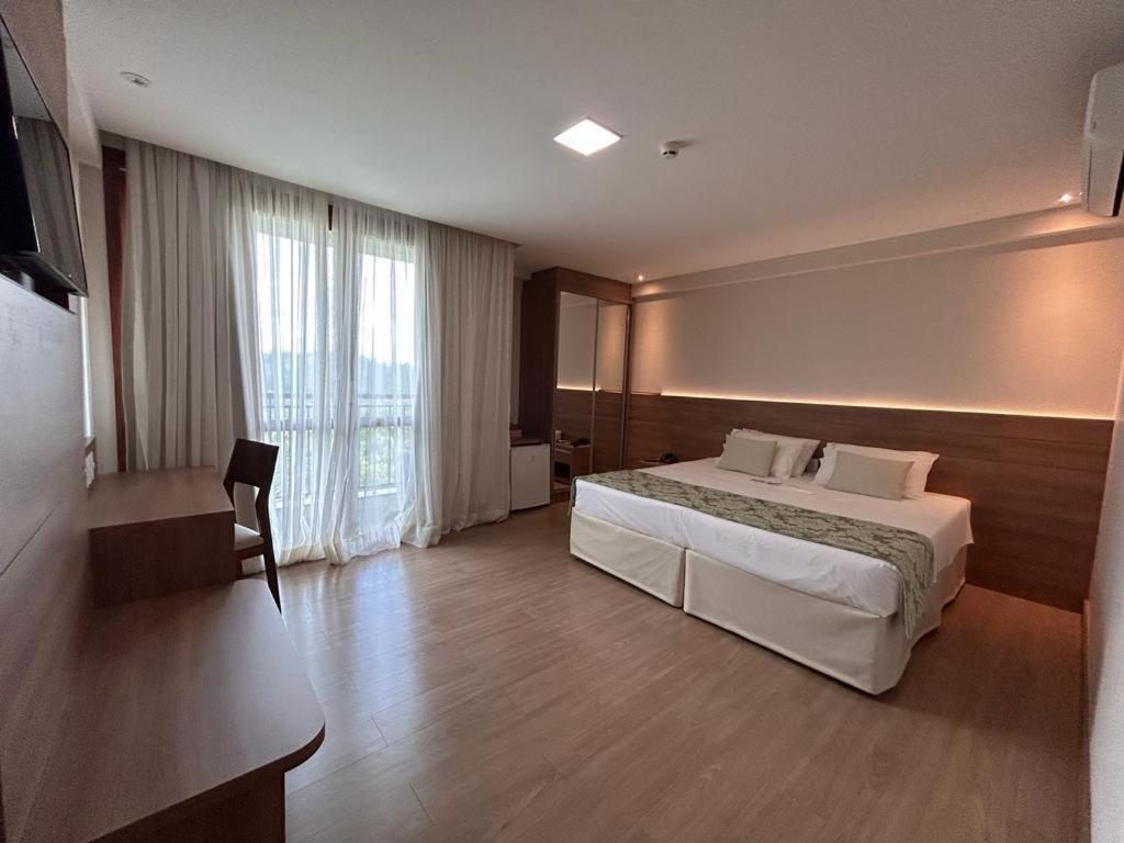 Giường trong phòng chung tại Vista Azul Hotel
