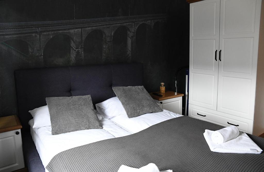 Postel nebo postele na pokoji v ubytování Apartamenty Stara Wisła